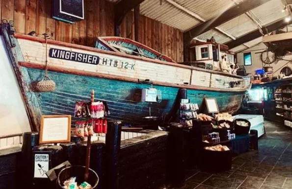 The hull of the 1940s trawler Kingfisher inside the Fishmarket